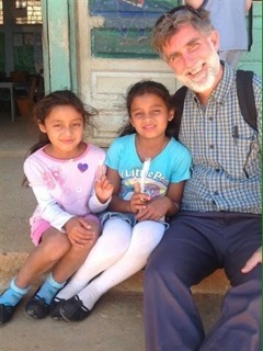 Dr. Tommy Ball with two school children in the Cedros community in the San Marcos District, Intibuca province of Honduras. COURTESY PHOTOS TOMMY BALL